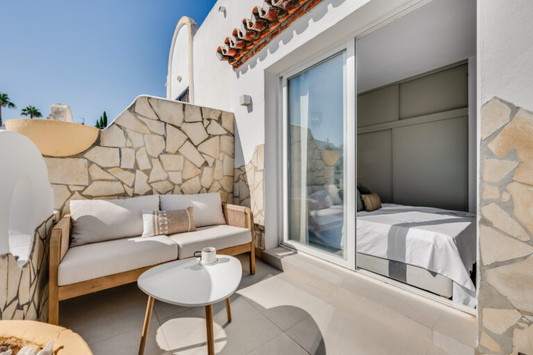 Private balcony seating beside bedroom 2