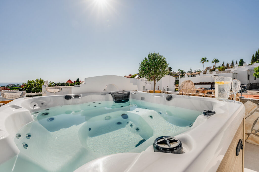 The private rooftop jacuzzi at Casa Cabopino Retreat, heated all year and looking out over the Mediterranean