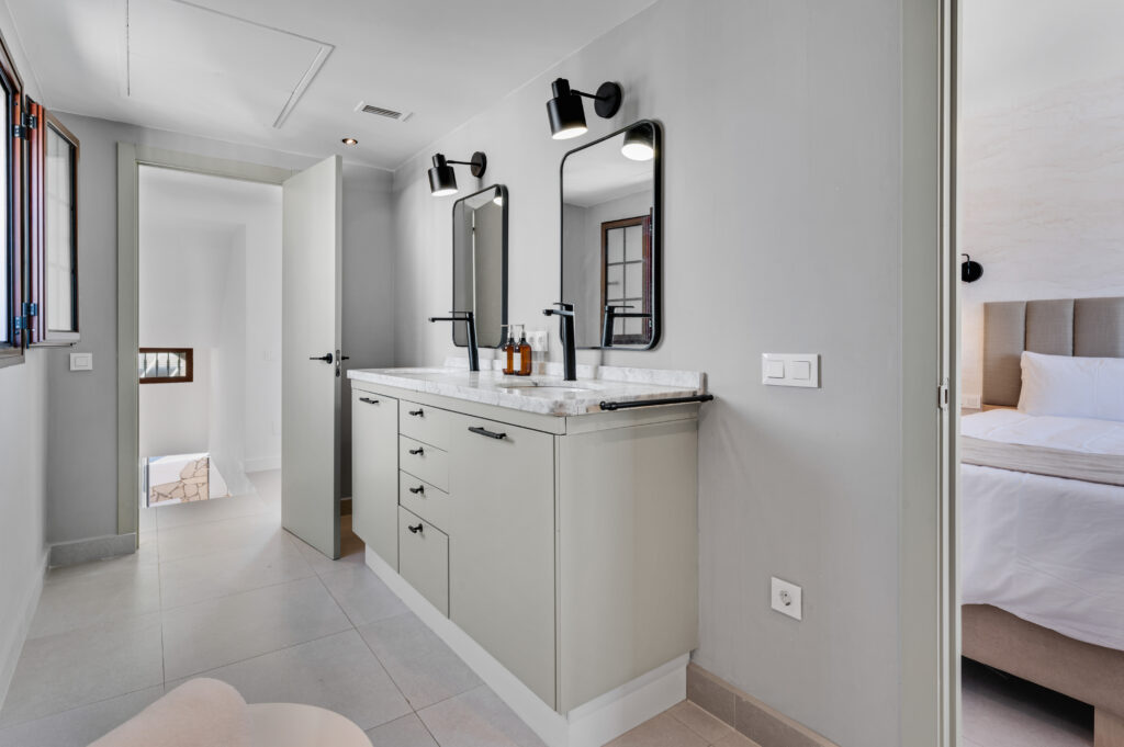 Double vanity in the bathroom connected to the master bedroom