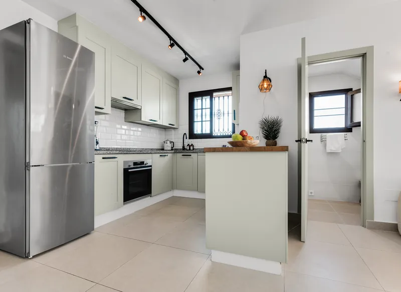 Fully equipped kitchen with oven, hob and fridge-freezer at Casa Cabopino Retreat